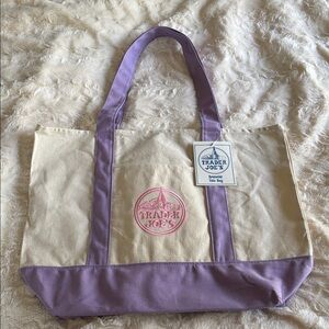 NWT Trader Joe’s lavender big tote in hand